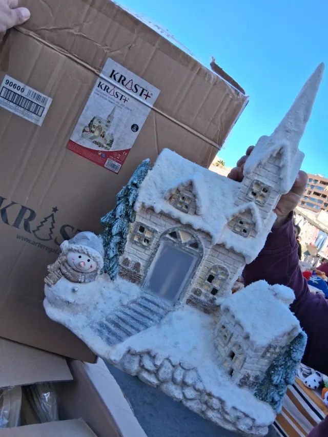 Casa de Natal com boneco de neve