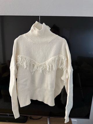 Jersey de punto beige con flecos marca tex