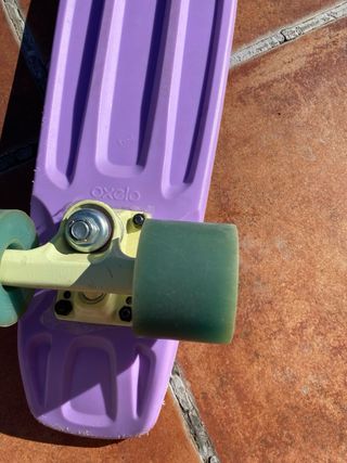 Patinetes Decathlon morado y negro