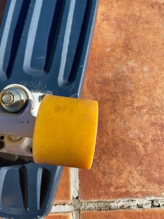 Patinetes Decathlon morado y negro