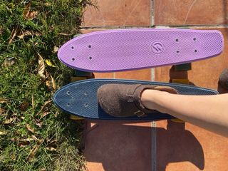 Patinetes Decathlon morado y negro