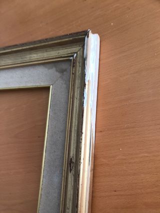 Marco de cuadro dorado y madera