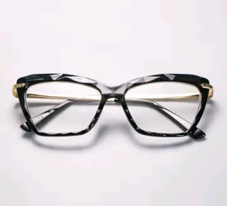 Gafas de diseño negro y dorado graduadas