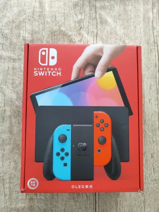 Nintendo Switch OLED sin abrir + accesorios