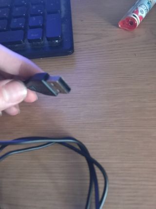 Ratón HP Negro con Rueda Azul