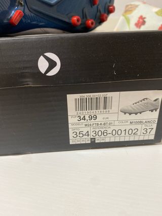 Zapatillas de fútbol blancas y azules