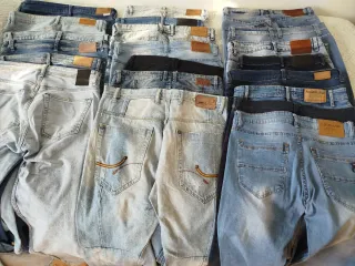 Lote 21 pantalones vaqueros distintas marcas, 42.