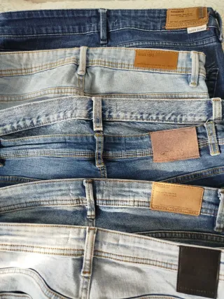 Lote 21 pantalones vaqueros distintas marcas, 42.