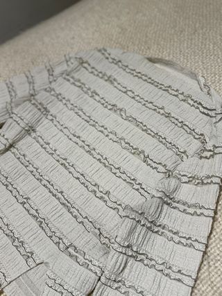 Blusa manga larga con volantes