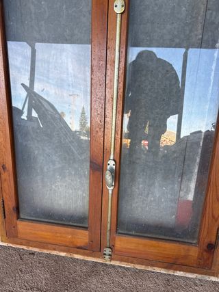 Ventana de madera cristalera.