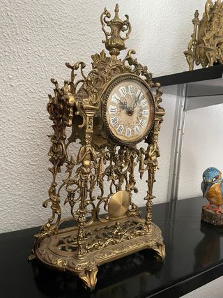Reloj y candelabro bronce antiguo