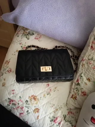 Bolso de fiesta negro con cadena