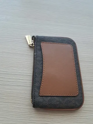 Cartera Michael Kors Negra y Dorada