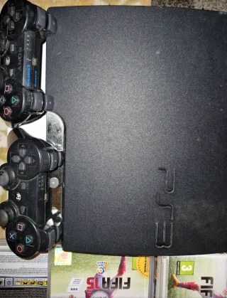 Consola PS3 CECH-2504B con 2 mandos y 8 juegos