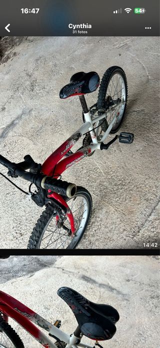 Bicicleta infantil roja y blanca