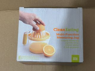 Tazza dosatrice, spremiagrumi e grattugia 3 in 1