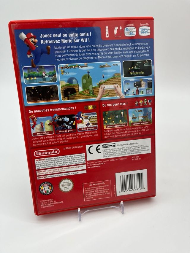 Nintendo Wii Rosso con gioco Super Mario Bros.