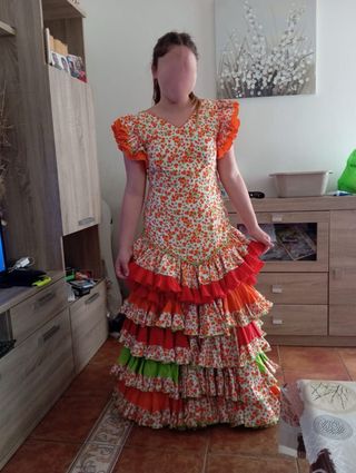 Vestido de flamenca volantes naranja y rojo