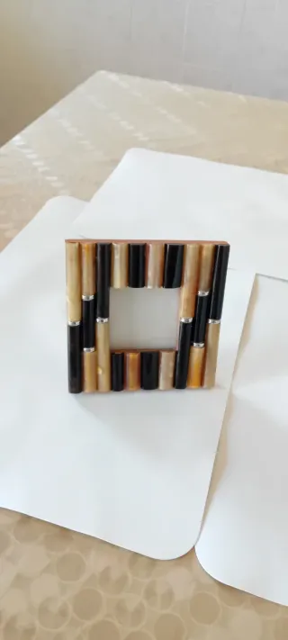 Cornice decorativa legno e plastica e osso