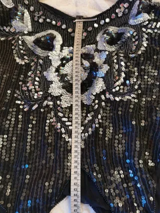 Top pedrería y lentejuelas negro/plata