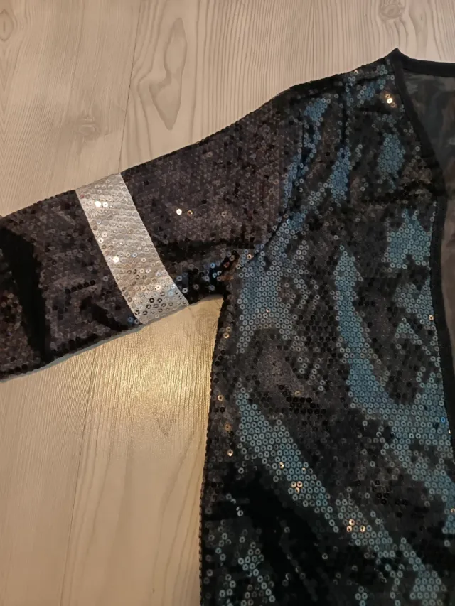 Chaqueta lentejuelas negra y plateada