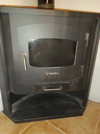 Estufa de leña rinconera metal y cristal