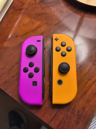 Mandos Nintendo Switch Morado y Naranja