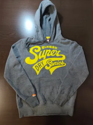 Sudadera Superdry gris con logo amarillo