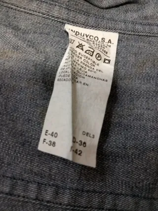 Cazadora vaquera azul con flecos