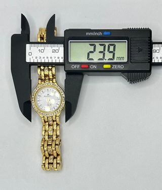 Reloj Dama de oro de 18k diamantes, 53.23 g.