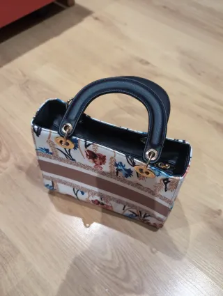 Bolso de mano estampado floral