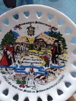 5 platitos de porcelana con soportes