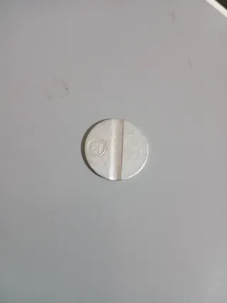 Gettone in alluminio circolare con incisione et