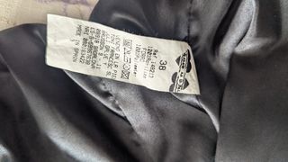 Bolero pelo sintético negro y gris