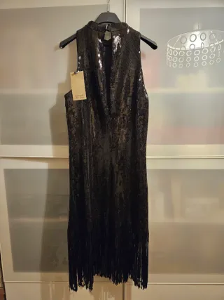 Vestito nero con frange