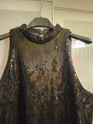 Vestito nero con frange