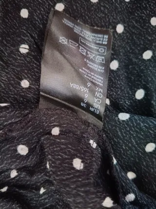 Camiseta lunares negra y blanca