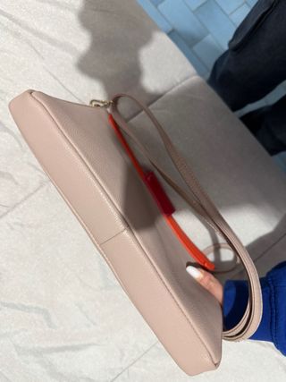 Borsa a mano rosa con dettagli arancioni