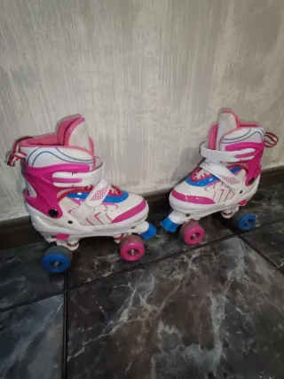Patines en línea infantiles rosas y blancos
