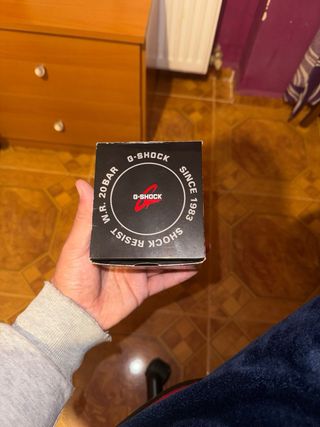 G-Shock Reloj Negro y Dorado