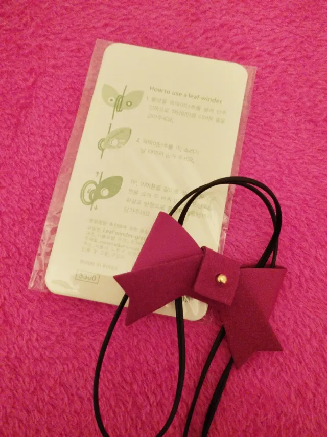 Auricolari avvolgitubo a fiocco e foglia