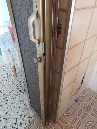 Puerta plegable corredera