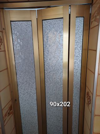 Puerta plegable corredera