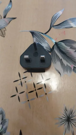 Adaptador de enchufe negro