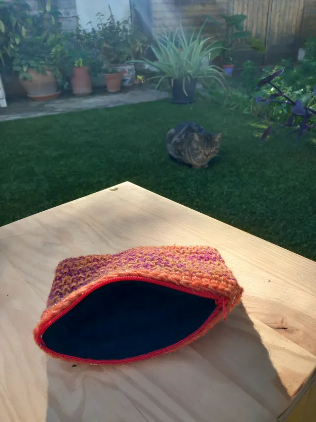 Bolsillo ganchillo hecho a mano naranja y morado