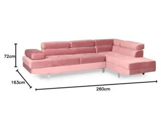 Divano angolare in velluto rosa con cuscini