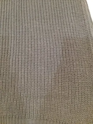 Chaleco largo negro para invierno.