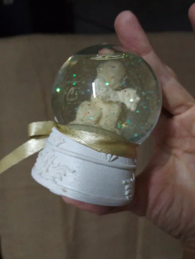 Bola de neve anjinho dourado