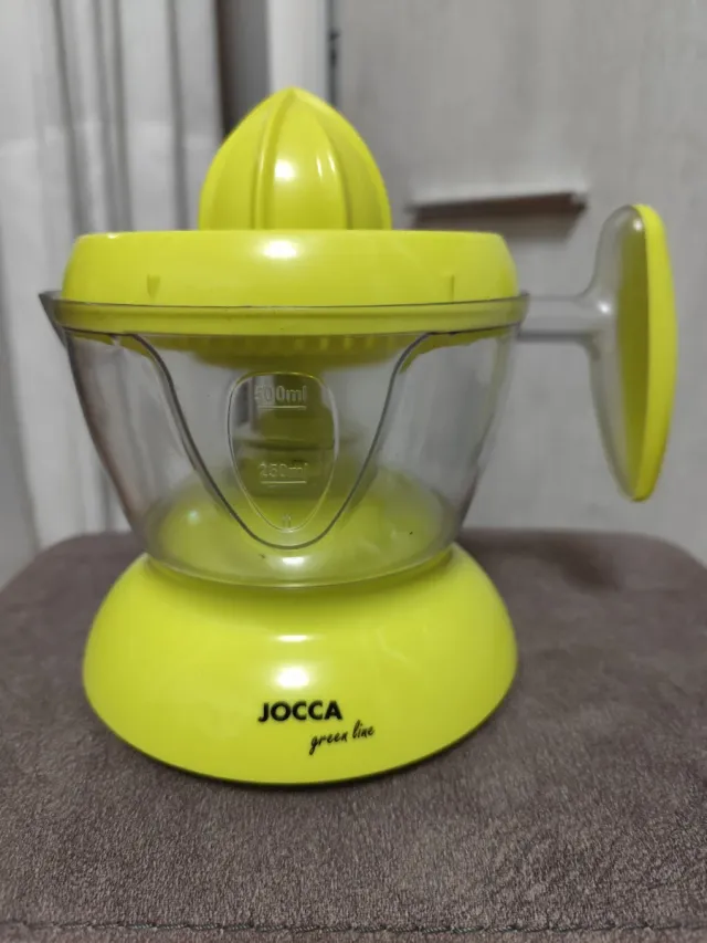 Exprimidor de cítricos con jarra