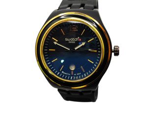 RELOJ SWATCH IRONY NEGRO DETALLES DORADOS